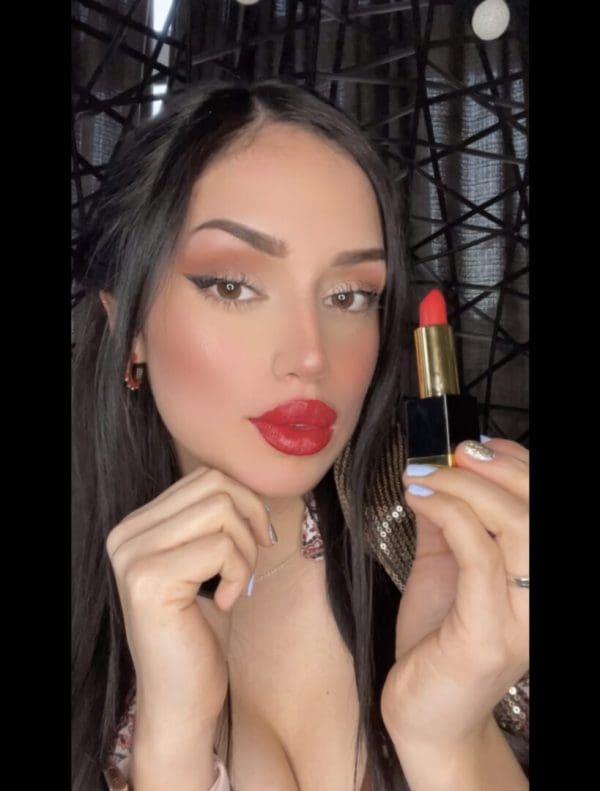 Model wearing H Hydrogen Bomb Babe lipstick by TAKENBeauty