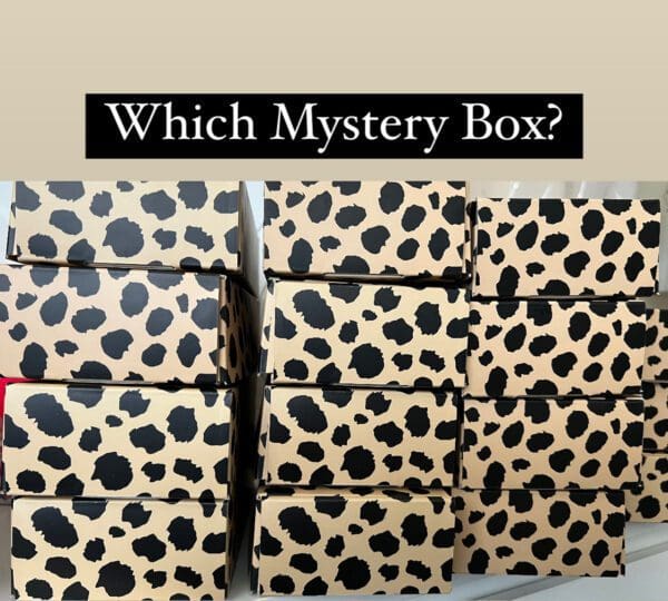 A bunch of boxes that are all covered in black spots