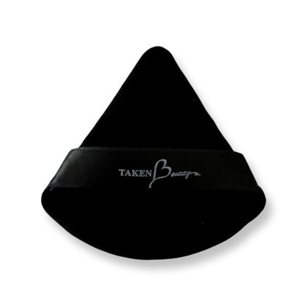 A black triangle shaped pillow with the words " fancy bunny ".