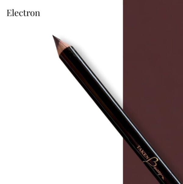 A black pencil is next to a maroon paper.