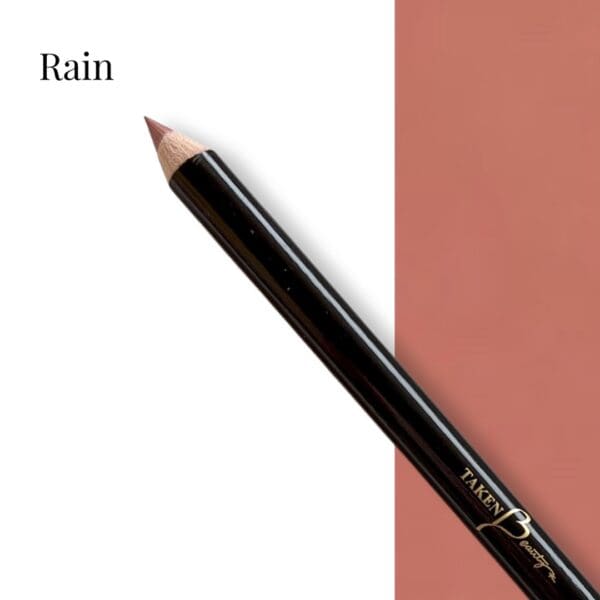 A close up of the side of a pencil with the word rain on it.
