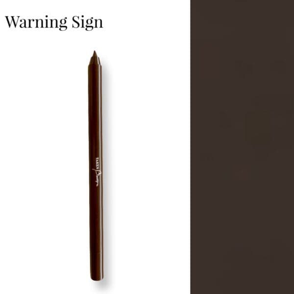 A brown pencil with the words warning sign underneath it.