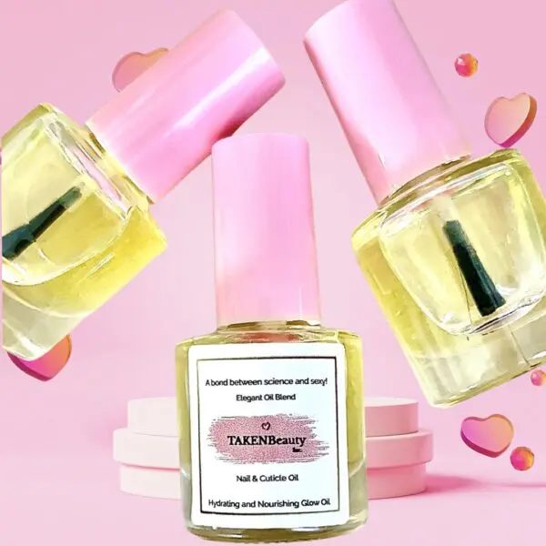 A pink bottle of nail polish with three bottles in the background.