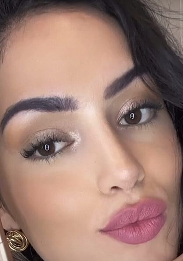 A close up of a person with long eyelashes