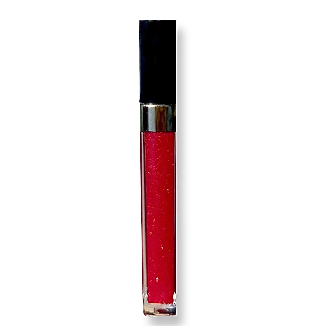 A red liquid lipstick is shown on top of a white background.