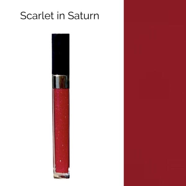 A red liquid lipstick with the words " scarlet in saturn ".